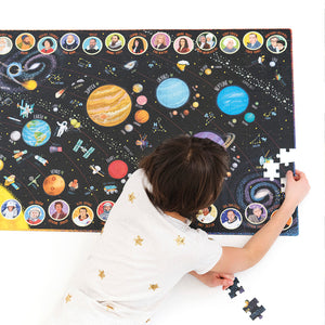 Banana Panda Suuuper Size Solar System Floor Puzzle, being played with