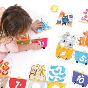 Banana Panda Make-a-Match Number Train Puzzle, being played with