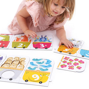 Banana Panda Make-a-Match Number Train Puzzle, being played with
