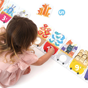 Banana Panda Make-a-Match Number Train Puzzle, being played with