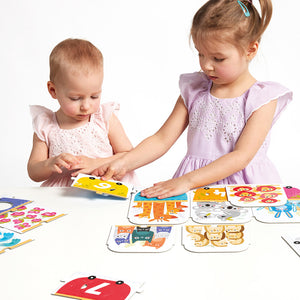 Banana Panda Make-a-Match Number Train Puzzle, being played with