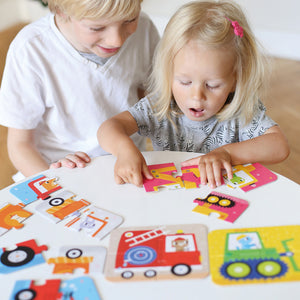 Banana Panda On-the-Go Travel Puzzles Vehicles, being played with
