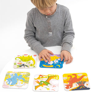 Banana Panda On-the-Go Travel Puzzles Dinosaurs, being played with