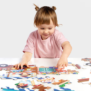 Banana Panda Play-as-You-Go Puzzle Camper Van, being played with