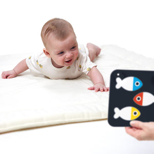 Banana Panda High Contrast Newborn Sensory Cards, being played with