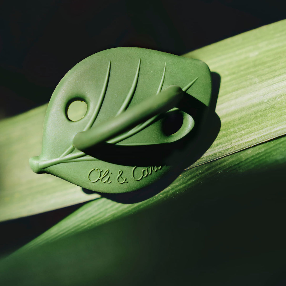 Oli & Carol Greens dummy with large easy-grip ring